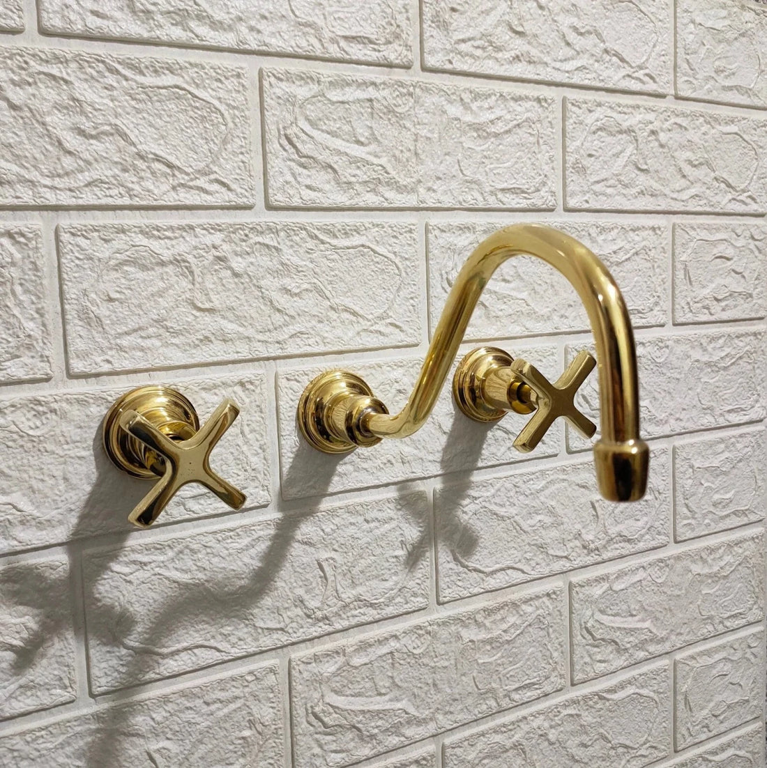 Unlacquered Brass Wall Mounted Faucet – Curved Spout, 9" Reach, Lead-Free | Solid Brass - The House Of Brass