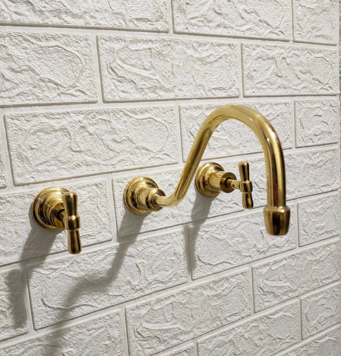 Unlacquered Brass Wall Mounted Faucet – Curved Spout, 9" Reach, Lead-Free | Solid Brass - The House Of Brass